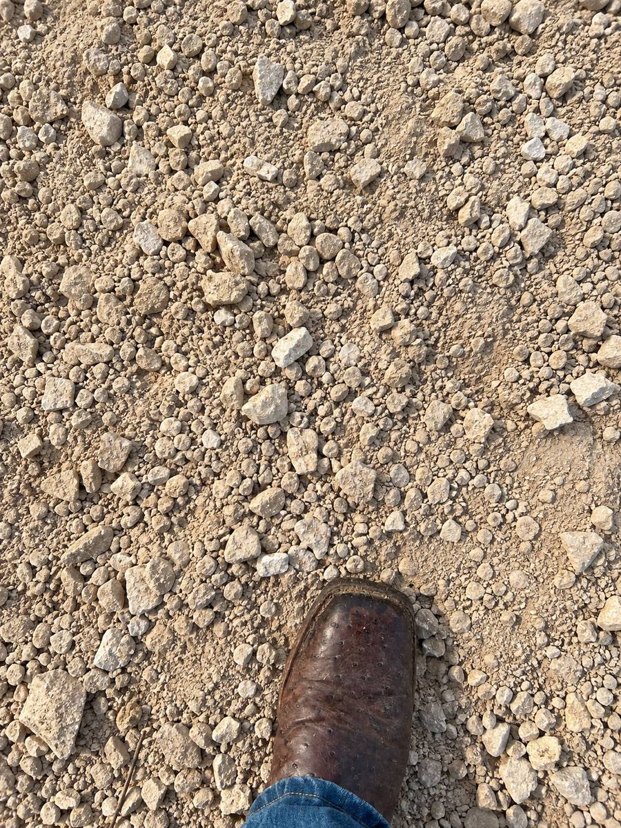 Regular base material with a work boot for scale